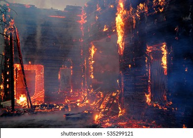 Firemen extinguish a house and building; 