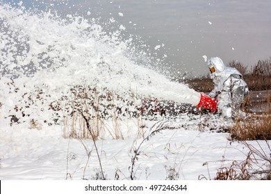 Firemen Pouring Flame With Firefighting Foam