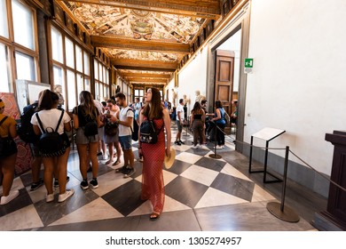 Firenze, Italy - August 30, 2018: Many People Busy Inside Famous Florence Uffizi Art Museum Gallery Hall With Architecture Interior Building And Tour In Tuscany Sculptures