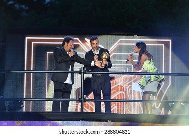 Firenze / Italy - June 14 2015: Marco Mengoni Winner On Stage Mtv Awards 2015 Firenze It Awarded By Enrico Brignano And Juliana Moreira