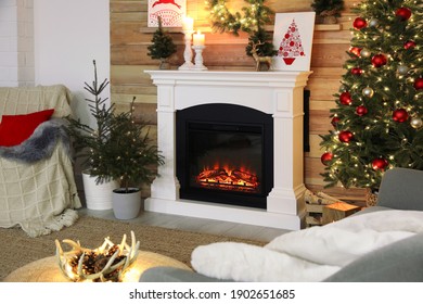 Fireplace In Beautiful Living Room Decorated For Christmas