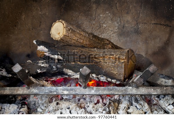 Fireplace Burning Wood Logs On Iron Stock Photo Edit Now 97760441
