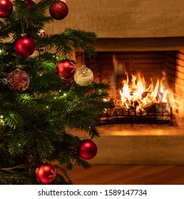 Fireplace Christmas Holiday. Warm Cozy Xmas Decorated Home. Christmas Tree, Burning Fireplace Background,