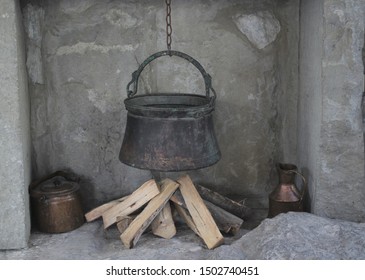 Fireplace, Firewood And A Large Copper Boiler, Installation