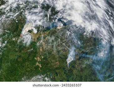 Fires in northern Canada Terra overpass. Fires in northern Canada Terra overpass. Elements of this image furnished by NASA. - Powered by Shutterstock