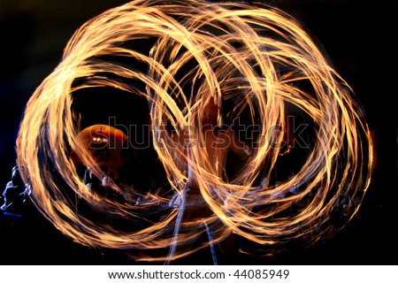 Fire-show man in action with fire