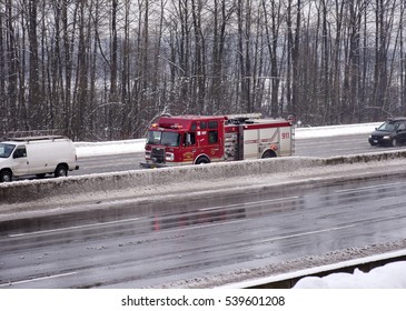 FIRETRUCK ON THE ROAD - DECEMBER 19, 2016: Burnaby's Firetruck Was Photographed In The Action On Trans-Canada Highway, Near Vancouver. British Columbia, Canada