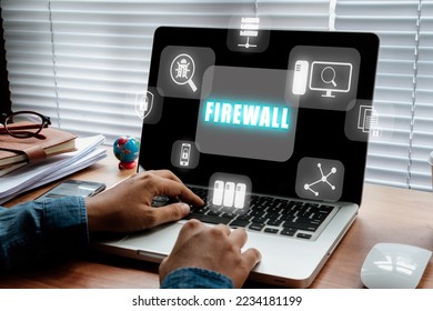 Firewall computing security concept, Person using laptop computer with Firewall icon on virtual screen, Business, Technology, Internet and network.