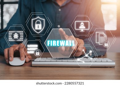Firewall computing security concept, Person working on computer with Firewall icon on virtual screen, Business, Technology, Internet and network.