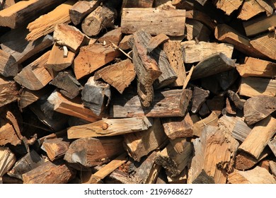 Firewood. Alternative And Cheap Energy Source For Heating. Heating Season. Background And Texture Of Wooden Logs. Wooden Fuel. Stock Of Renewable Resources For The Winter When Energy Prices Rise