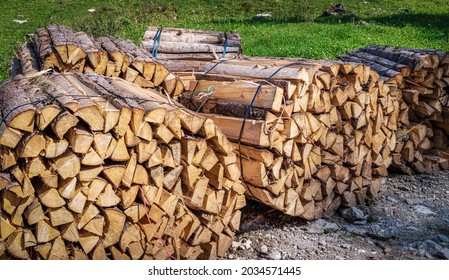 Firewood Bundles In Swiss Alps, Ready For Shipment To A Recipient