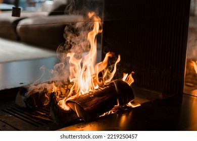 Firewood Burning In The Fireplace