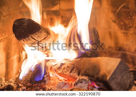 Firewood burning in fireplace fire wood heat interior
