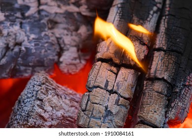 Firewood Is Burning. A Place To Keep Warm In Winter.  Selective Focus