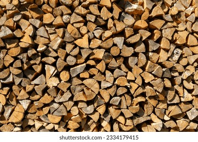Firewood for kindling background. Harvesting wood for a fireplace for the winter in the house