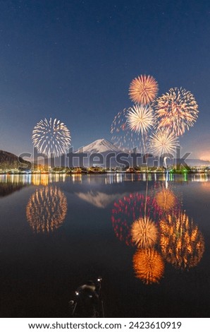 Firework around Fuji mountain in Kawagushiko lake Japan
