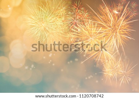 Firework display in multi colour and soft light bokeh.Time for celebration.
