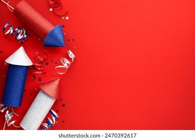 Firework rockets on red background with confetti, flat lay. Happy Independence Day banner design.