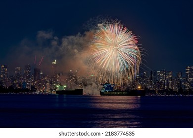 fireworks with cityscape in the background