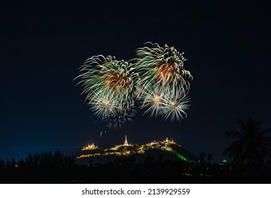 Fireworks colorful fireworks Watch the blissful celebration above the beautifully lit pagoda on the hillside.
(night atmosphere but focus on colorful fireworks)