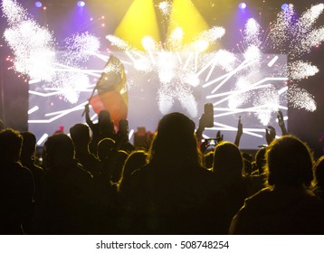 Fireworks and crowd celebrating the New Year - Shutterstock ID 508748254