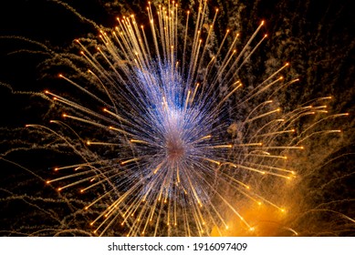 
Fireworks Explode At Night In The Sky