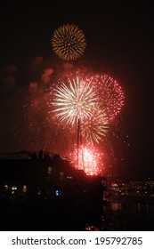 Fireworks Explode Over Puget Sound On The Fourth Of July In Seattle, Washington.