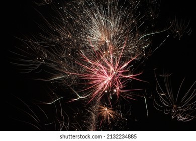 Fireworks exploding against dark sky