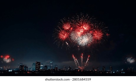 Fireworks exploding over a city skyline at night illuminated with red and white bursts pyrotechnics