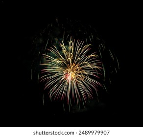 Fireworks Exploding Over the Mountains at night. Vail, Colorado