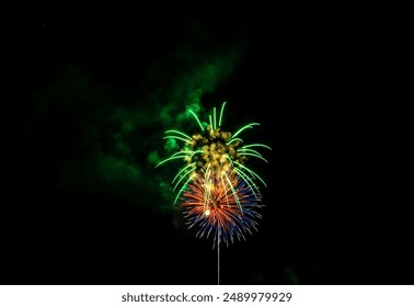 Fireworks Exploding Over the Mountains at night. Vail, Colorado