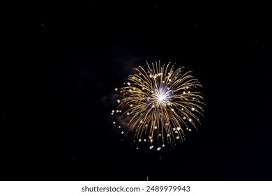 Fireworks Exploding Over the Mountains at night. Vail, Colorado
