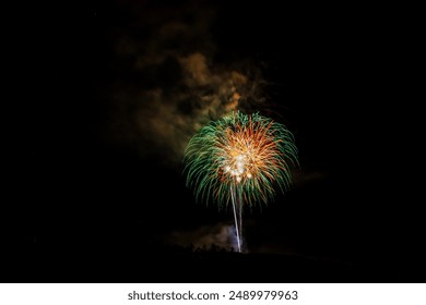 Fireworks Exploding Over the Mountains at night. Vail, Colorado