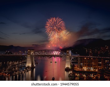 Fireworks from The Honda Celebration of Lights over False Creek overlooking Burrard Bridge  in Vancouver, British Columbia