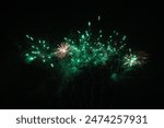 Fireworks on the dark sky background. Colorful fireworks. Abstract colored firework background with free space for text. fireworks light up the night sky