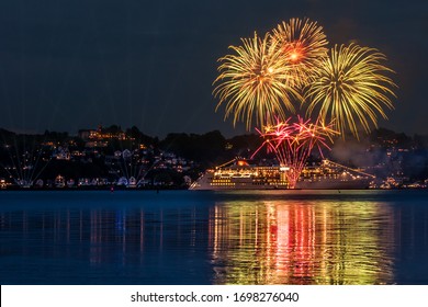 Fireworks over a cruise ship at the christening in Hamburg in front of the Suellberg in Blankenese