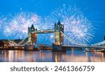 Fireworks over Tower Bridge and Tower of London on Thames river at twilight blue hour - London England