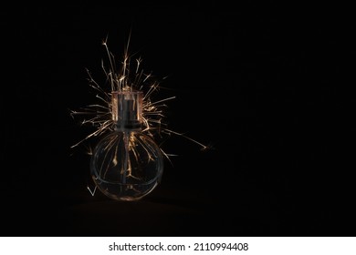 Fireworks Sparkler Behind A Perfume Bottle, Product Photography