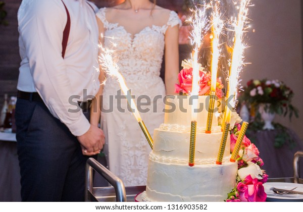 Fireworks Wedding Cake On Background Newlyweds Stock Image