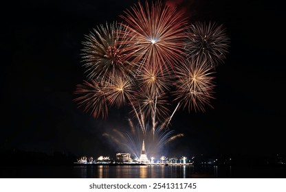 Fireworks and white pagodas by the river at night, Samut Prakan, Thailand - Powered by Shutterstock