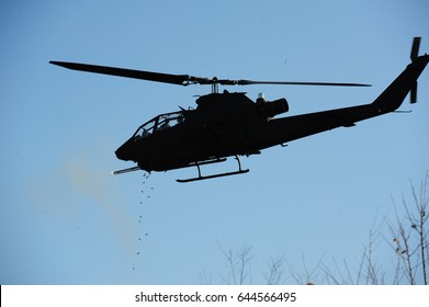 Firing AH-1S Cobra Helicopter  Silhouette