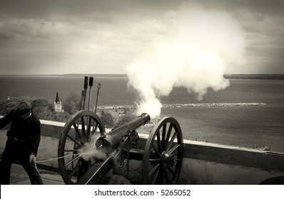 Firing A Cannon Ball On Fort In Black And White