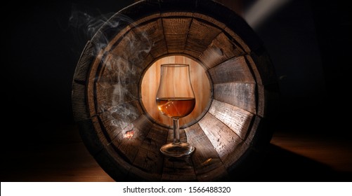 Firing Of An Oak Barrel Using An Unusual Lens