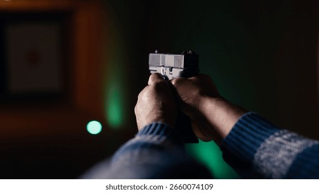 Firing range customer doing shooting activity with pistol, checking if he shot bullseye. Close up of person in shooting gallery learning how to use firearm, analyzing targets shot, camera B