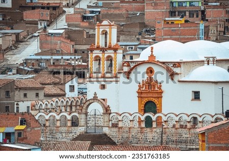 First aboriginal church. Distant view of the ancient San Benito church in Potosi city, Bolivia. Temple with Latin cross and several domes. Southamerica