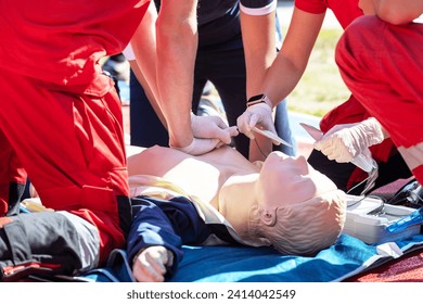 First aid and CPR training using Automated External Defibrillator device - AED - Powered by Shutterstock - Get 15% off with code: PIKWIZARD15