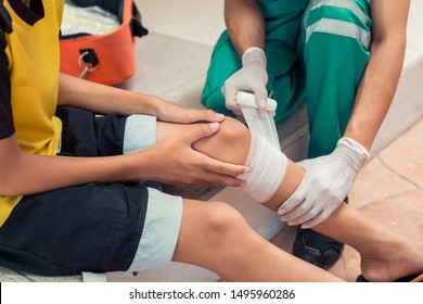 First Aid. Doctor bandages to stop the bleeding first aid for the wounded. Concept first aid and treatment for patients.