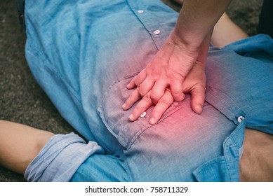 First Aid Emergency CPR on a Man who has Heart Attack or Shock , One Part of the Process Resuscitation - Healthcare Concept