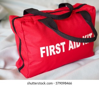 First Aid Kit Closeup.
A first aid kit bag in closeup, against a neutral background.