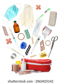 First Aid Kit. Different Medical Supplies Falling On White Background